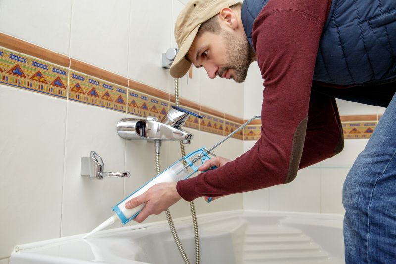 Professional bathtub installer working